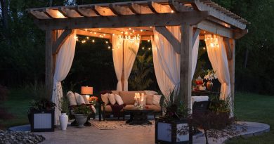 photo of gazebo with curtain and string lights