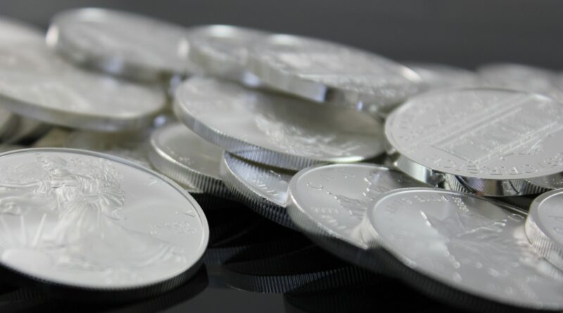 clear glass round plate on black textile